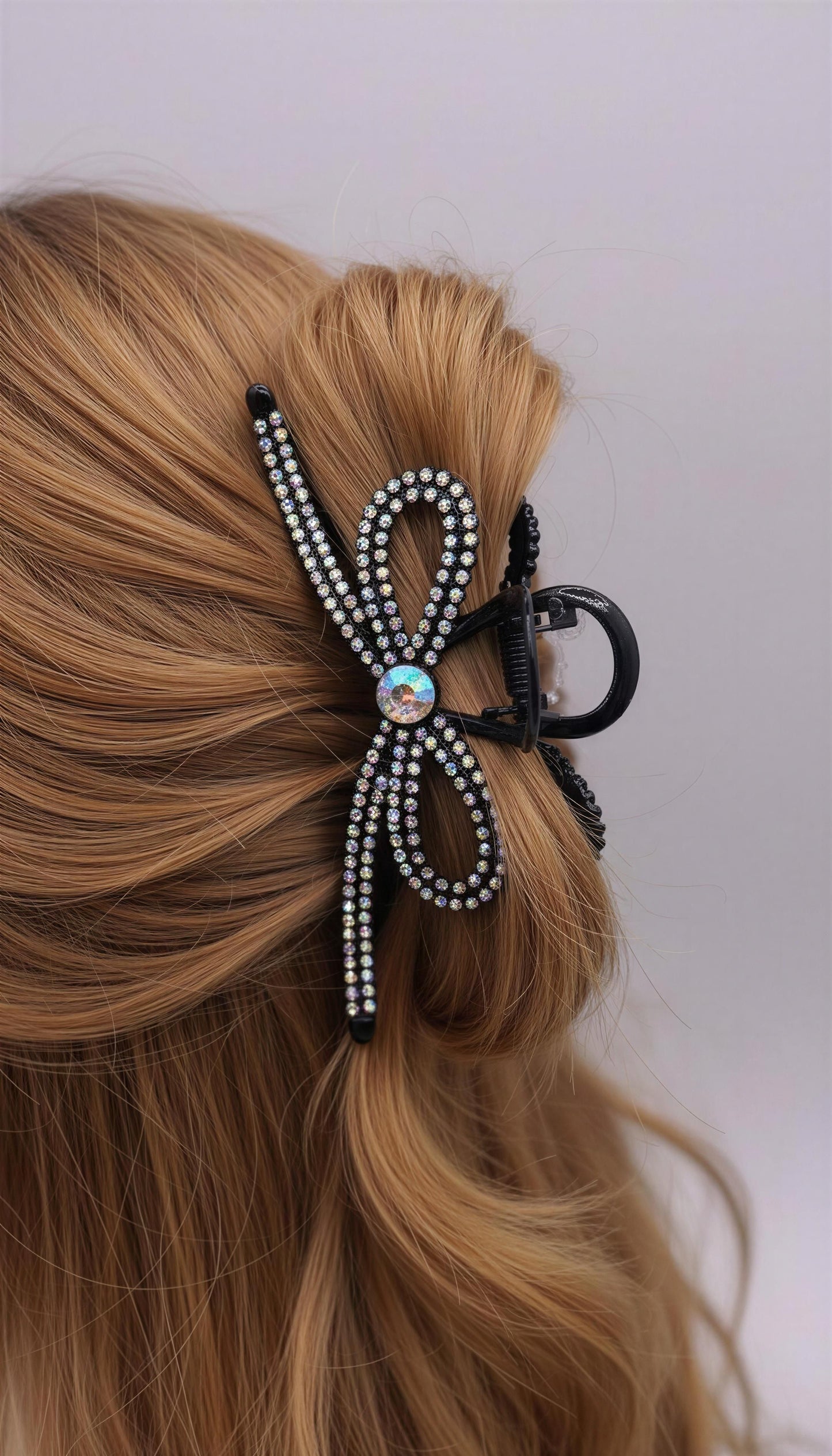 Sparkly black butterfly clip