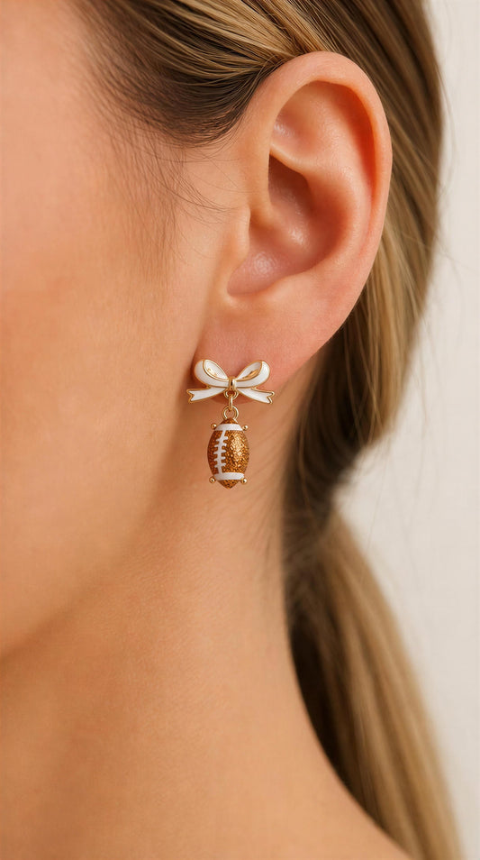 Bow accent football earrings