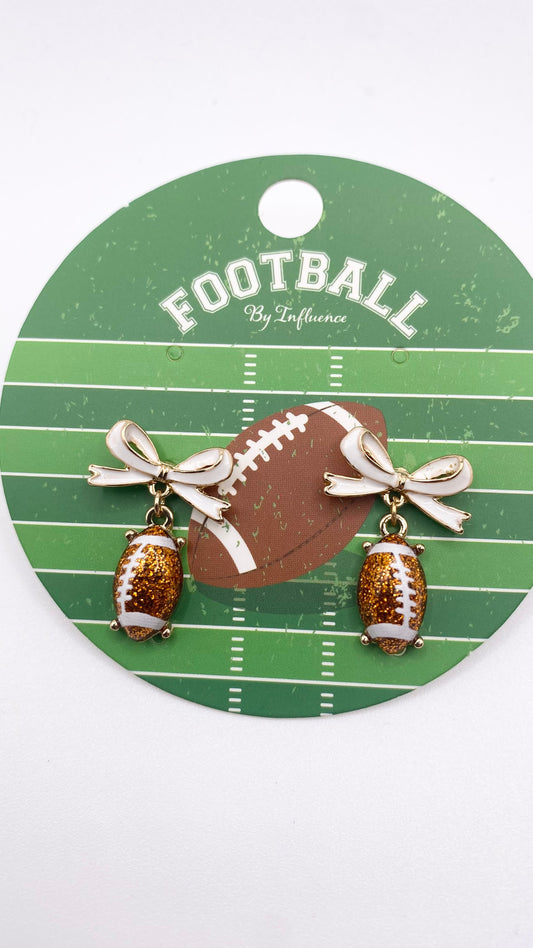 Bow accent football earrings